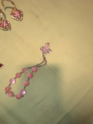 Orecchini e bracciali con cuori e farfalla