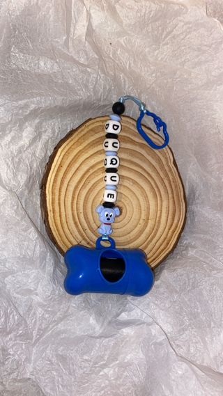 Porta bolsas para perros con dije de perro