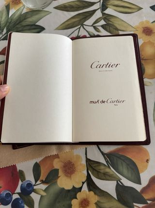 rubrica Cartier vintage in pelle bordeaux