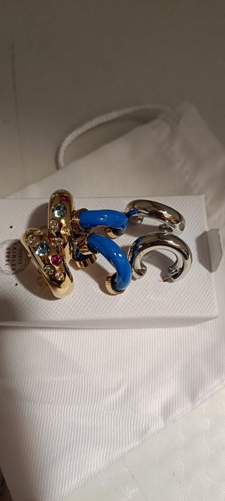 Tris orecchini Guess oro e blu