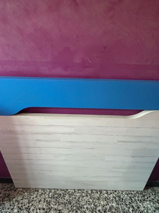 Cabeceros de madera azul y blanco