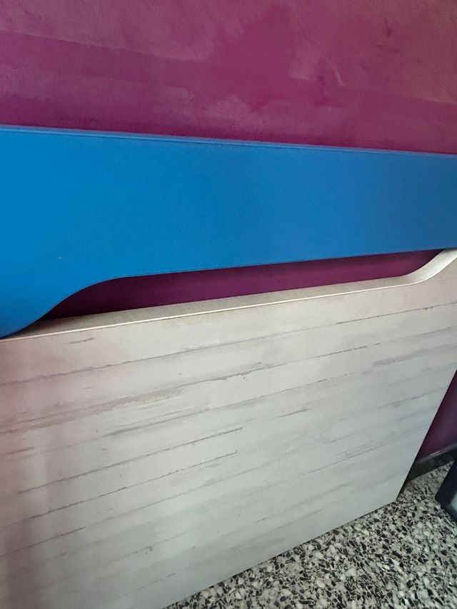 Cabeceros de madera azul y blanco