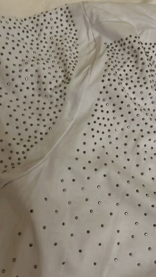 Maglia bianca con brillantini