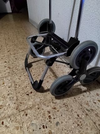 Carro de compra, triple ruedas para subiresclera
