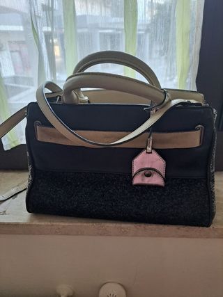 Borsa bauletto nera e maculato con tracolla
