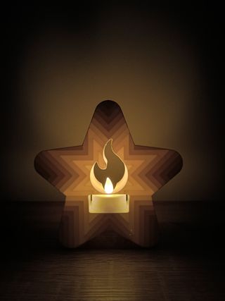 Estrella portavelas LED navideña