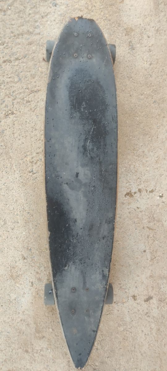 Longboard con diseño de atardecer