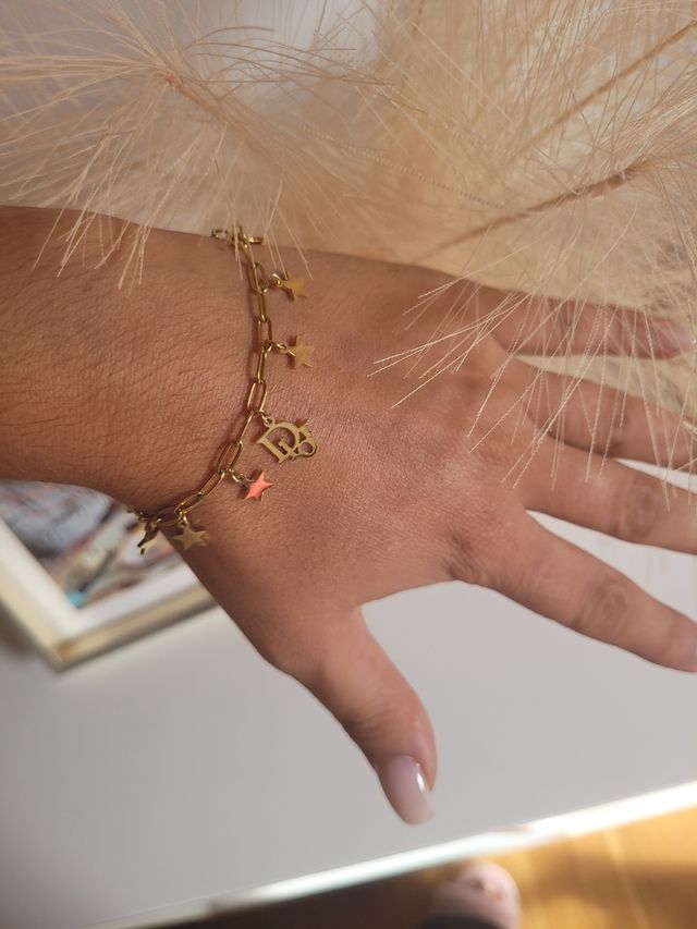 Pulsera Dior Acero Dorado Estrellas equivalencia