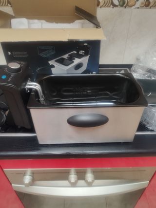 Freidora de aceite(perilla de control rota) 