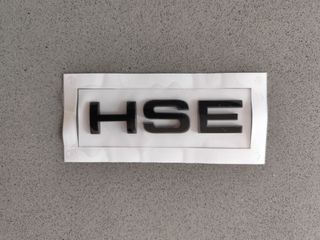 Scritta HSE per Range Rover Sport