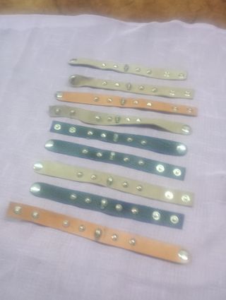 N. 9 braccialetti artigianali beige e arancioni