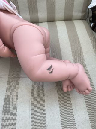 Muñeco bebé con ropa y accesorios
