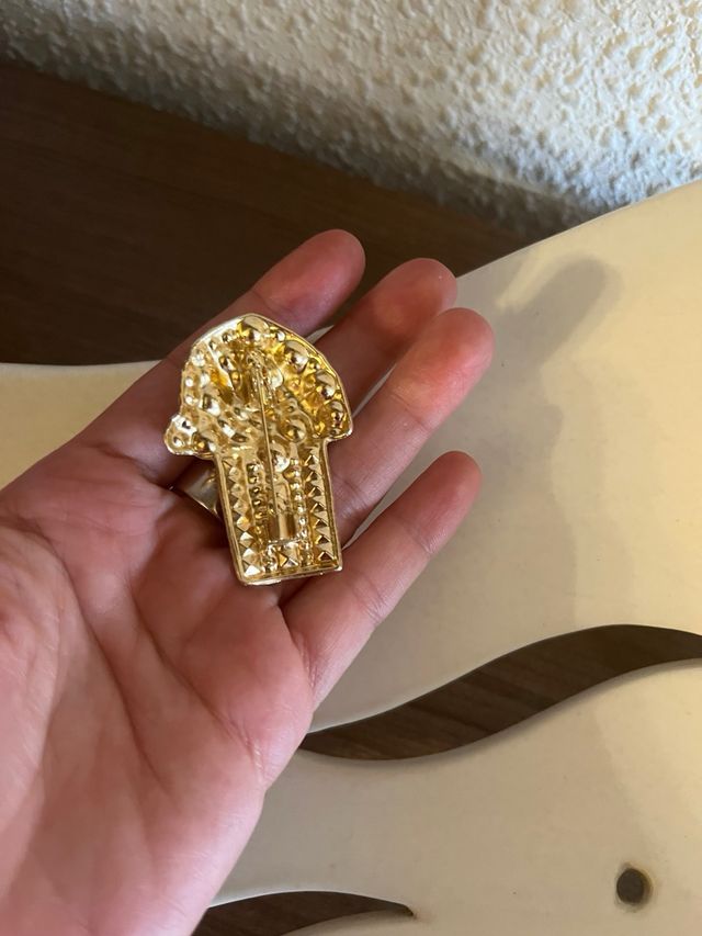 Broche de palomitas de maíz con brillantitos