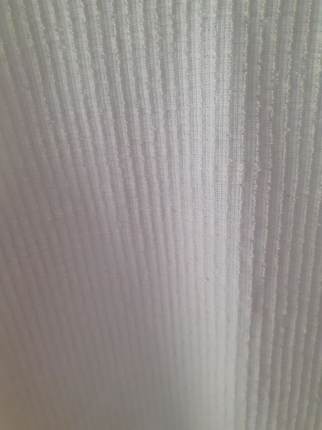 Top sin mangas elegante blanco y negro