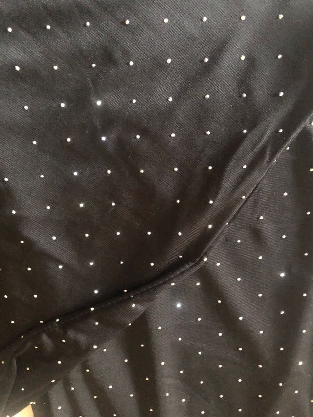 Pantaloni a zampa con brillantini