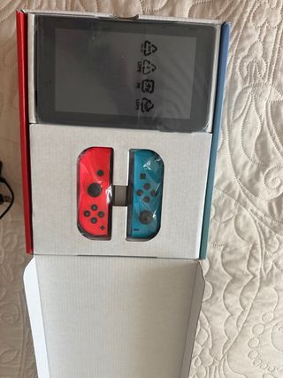 Nintendo Switch + 2 Mandos + Base Carga