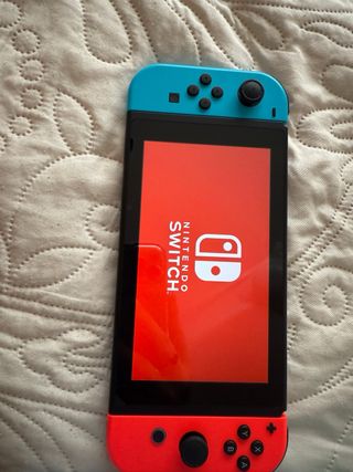 Nintendo Switch + 2 Mandos + Base Carga