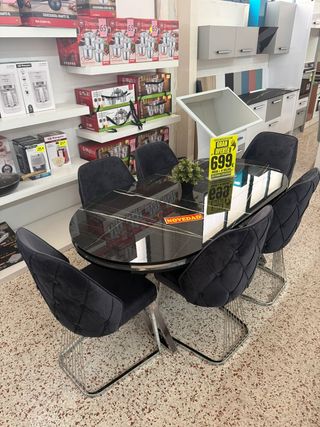 Mesa de comedor negra con 6 sillas