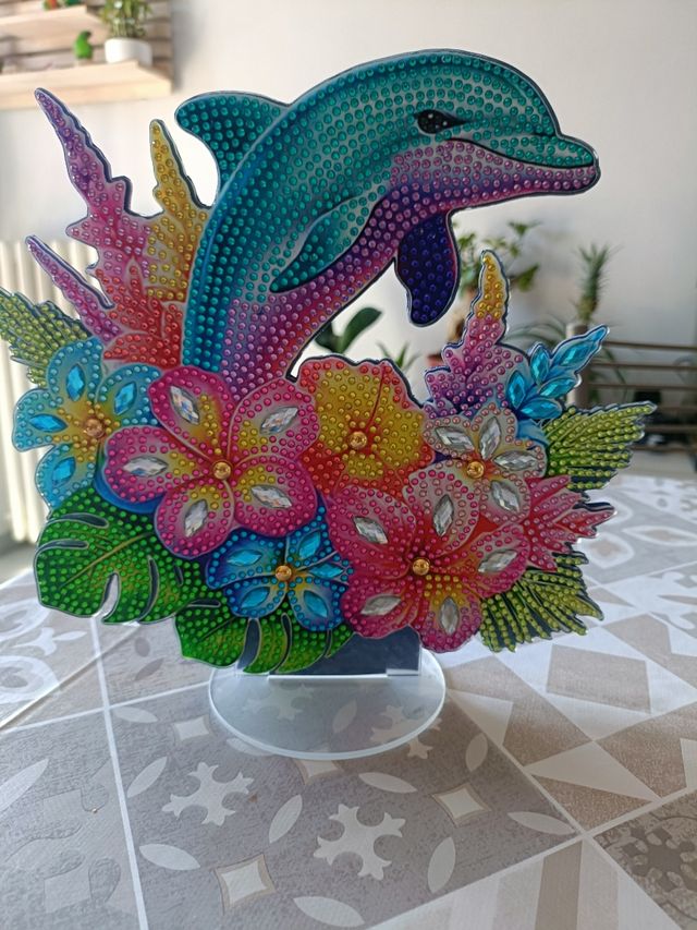 Decorazione delfino con fiori