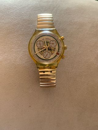 Reloj Swatch Dorado Cronógrafo
y todo original 