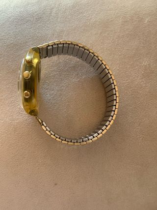 Reloj Swatch Dorado Cronógrafo
y todo original 