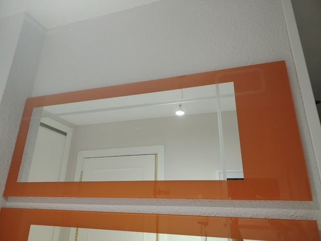 Espejos decorativos naranja y transparente