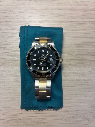 Reloj Rolex Oro y Negro