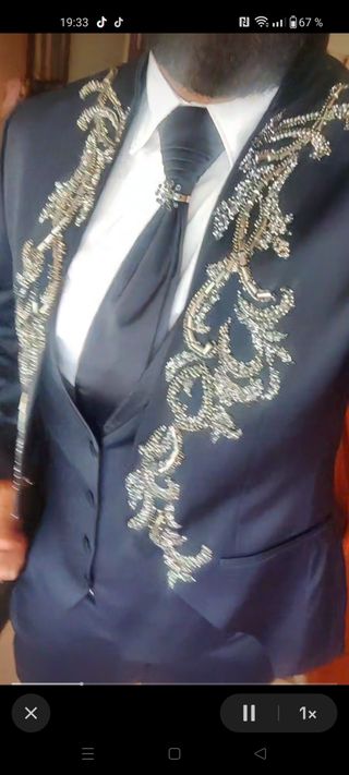 Traje de boda gitana azul y plateado
