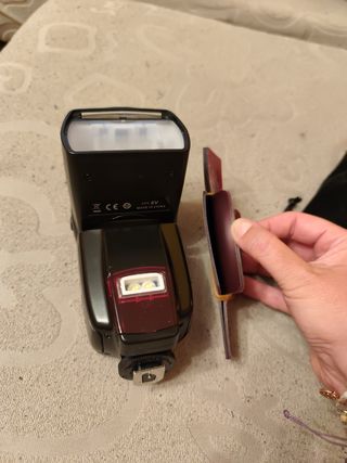 Flash Andoer AD-560II para cámara de fotos.