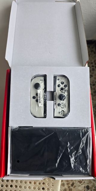 Nintendo Switch OLED Blanca poco uso como nueva
