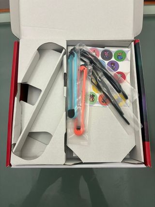 Nintendo Switch gris y naranja