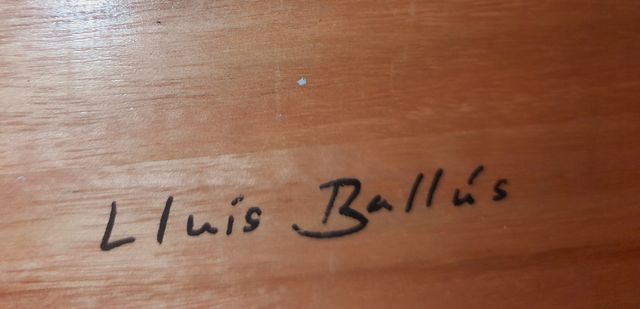 Mueble de entrada con espejo y cuadros vintage