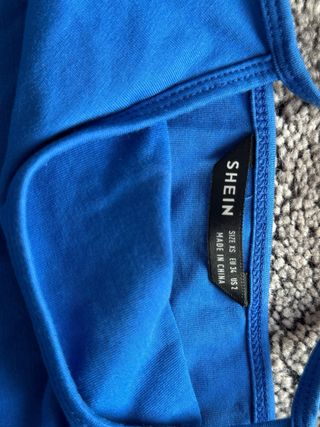 Top azul de tirantes