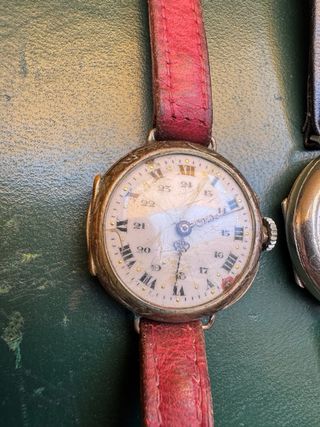 2 orologi Trench