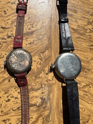 2 orologi Trench