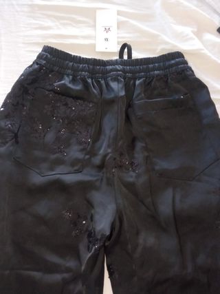 Pantalón negro T.XS con etiqueta