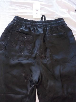 Pantalón negro T.XS con etiqueta