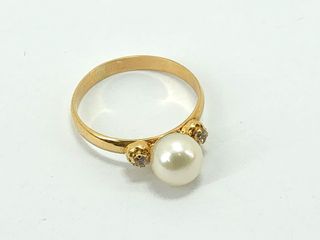 anillo oro 18k con piedra con circonita,perla
