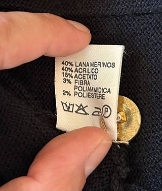 Cardigan nero e oro con bottoni