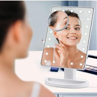 Espejo de maquillaje aumento  con luces LED