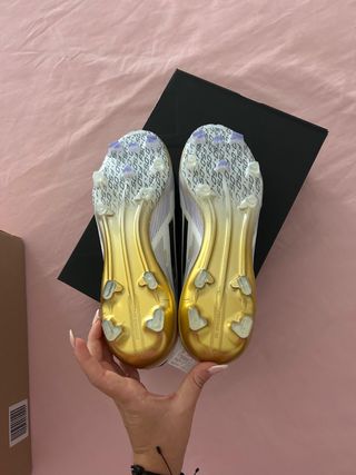 Botas Adidas F50 Elite Oro y Blanco
negociables 