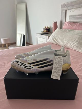 Botas Adidas F50 Elite Oro y Blanco
negociables 