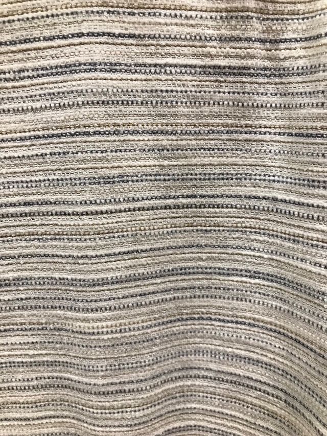 Chaqueta de punto azul claro, blanco y dorado