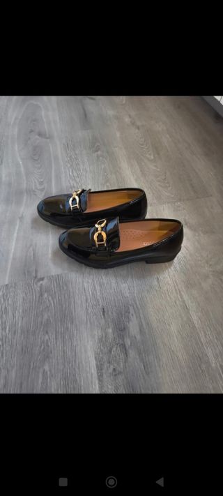 Mocasines negros brillantes mujer