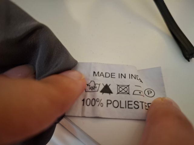 Maglia elegante smanicata grigia