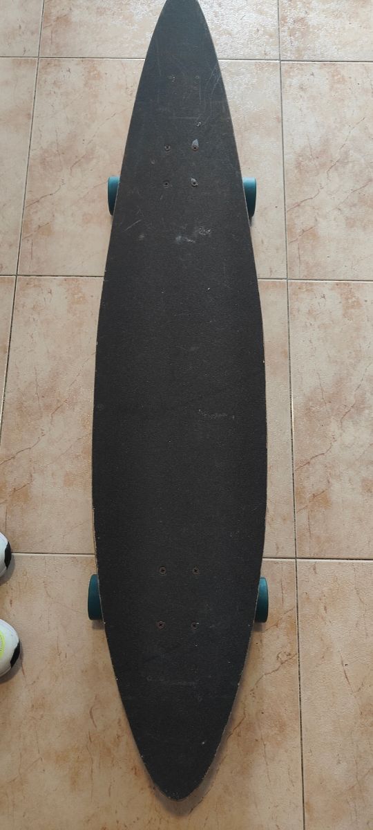 Longboard con diseño playero
