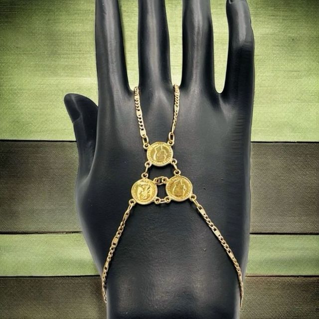 Pulsera manita 3 monedas de oro de 18k