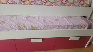 Cama nido blanca y rosa