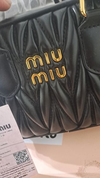 Borsetta Miu Miu nera e oro
