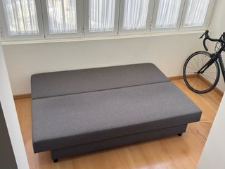 Sofá-cama con almacenamiento